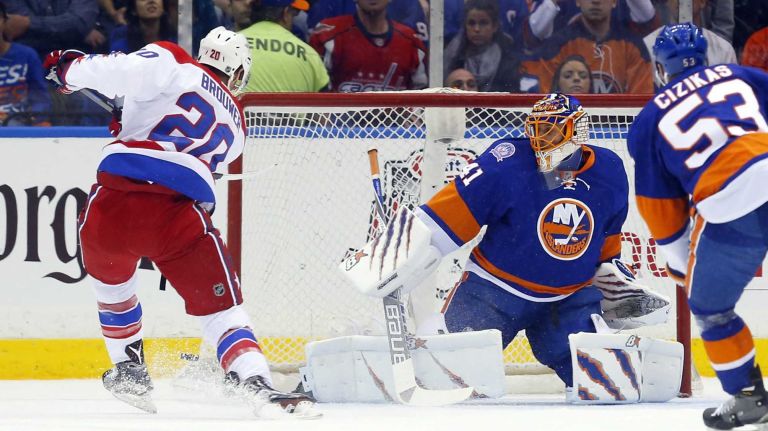 Jaroslav Halak #41 of the New York Islanders defends a first-period scoring chance against Troy Brouwer #20 of the Washington Capitals during Game 3 of the Eastern Conference quarterfinals at Nassau Coliseum on Sunday, April 19, 2015.