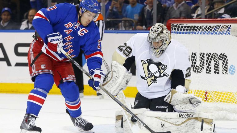 Marc-Andre Fleury #29 of the Pittsburgh Penguins makes a first-period save against Ryan McDonagh #27 of the New York Rangers during Game 1 of the Eastern Conference quarterfinals at Madison Square Garden on Thursday, April 16, 2015.