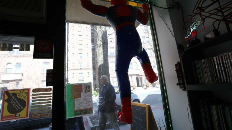 City Living: Kew Gardens photos 48 Spiderman in the window of the Comic Den, at 82-64 Austin Street in Kew Gardens, Queens, Monday, April 13, 2015