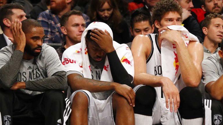 Joe Johnson 38 From left, Alan Anderson, Joe Johnson and Brook Lopez of the Brooklyn Nets look on from the bench during the first half against the Charlotte Hornets at Barclays Center on Wednesday, March 4, 2015.