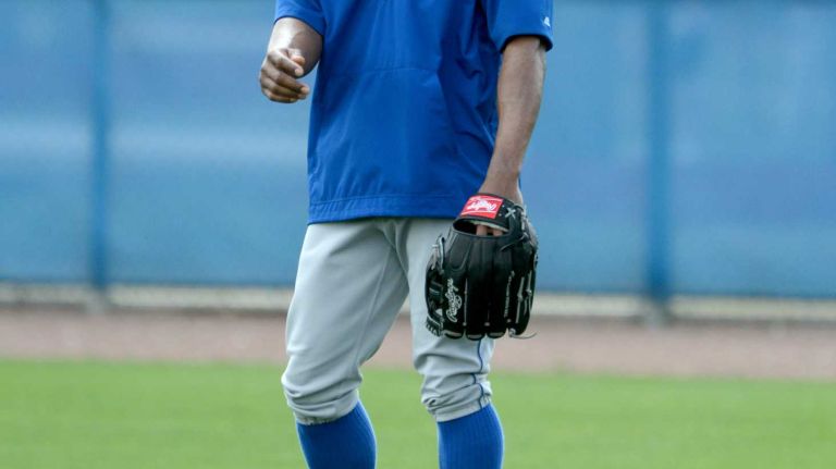NY Mets outfielder Curtis Granderson gets ready for to catch during a spring training workout Tuesday Feb 24, 2015.