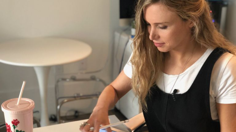 Samantha Rothenberg designs a comic on an iPad in her Williamsburg apartment on July 6.