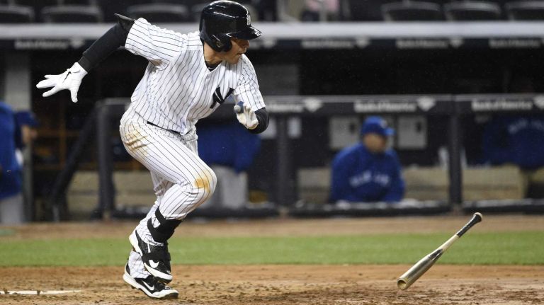 Jacoby Ellsbury 10 New York Yankees center fielder Jacoby Ellsbury runs on his single in the sixth inning against the Toronto Blue Jays in an MLB game at Yankee Stadium on Wednesday, April 8, 2015.