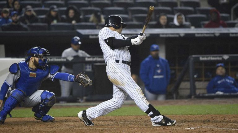 New York Yankees center fielder Jacoby Ellsbury grounds out to second against the Toronto Blue Jays to end the baseball game at Yankee Stadium on Thursday, April 9, 2015. The Blue Jays defeated the Yankees 6-3