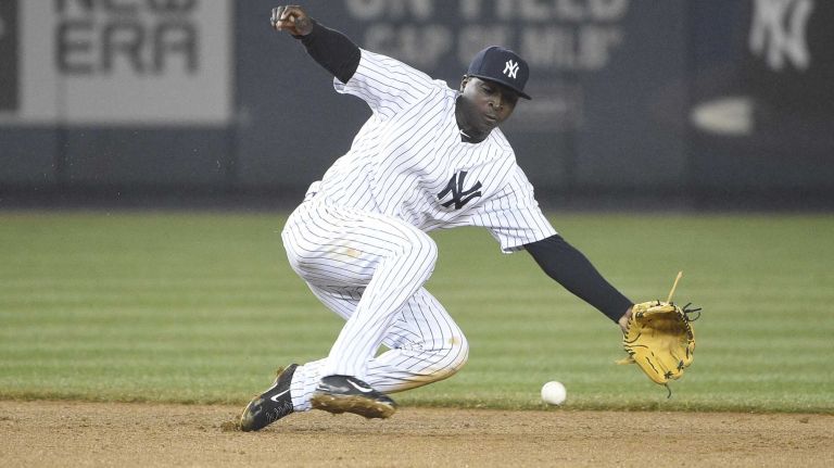 Yankees shortstop Didi Gregorius fields a ball hit by Toronto Blue Jays third baseman Josh Donaldson during a game at Yankee Stadium on April 9, 2015.