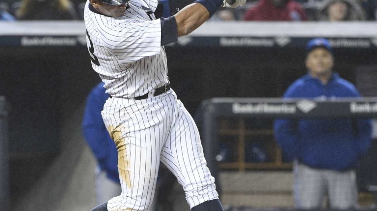 New York Yankees designated hitter Alex Rodriguez strikes out swinging against the Toronto Blue Jays in seventh inning a baseball game at Yankee Stadium on Thursday, April 9, 2015.