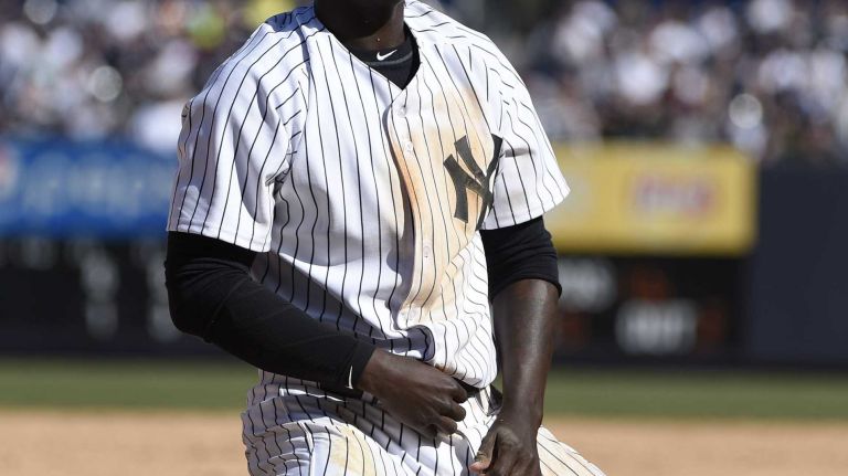Yankees shortstop Didi Gregorius reacts after he is tagged out attempting to steal third base in the eighth inning against the Toronto Blue Jays on Opening Day at Yankee Stadium on April 6, 2015.
