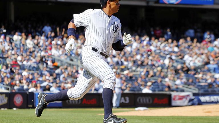 Alex Rodriguez #13 of the New York Yankees runs out his fifth-inning base hit against the Toronto Blue Jays during Opening Day at Yankee Stadium on Monday, April 6, 2015.