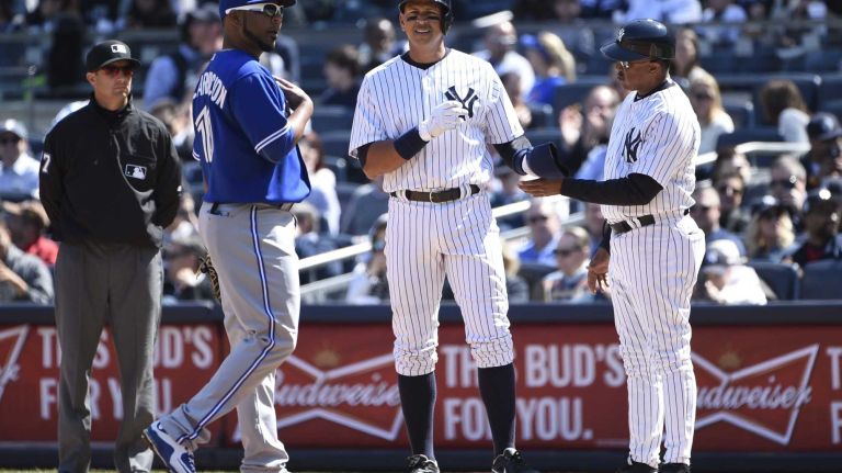 Yankees Opening Day in 2015 36 New York Yankees third baseman Alex Rodriguez stands on first base after drawing a walk in the third inning against the Toronto Blue Jays in a baseball game on Opening Day at Yankee Stadium on Monday, April 6, 2015.