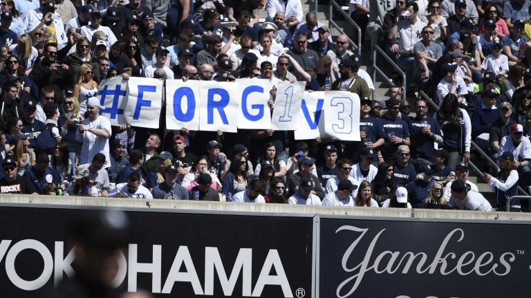 Yankees Opening Day in 2015 38 Fans hold a banner before New York Yankees third baseman Alex Rodriguez comes to the plate in the third inning against the Toronto Blue Jays in a baseball game on Opening Day at Yankee Stadium on Monday, April 6, 2015.