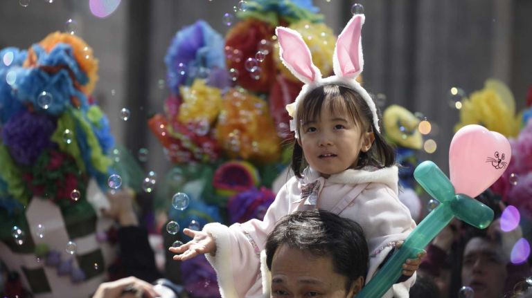 Participants and spectators wander along Fifth Avenue during the annual Easter Parade and Bonnet Festival in Manhattan, Sunday, April 05, 2015. The pageant is a New York City tradition that stretches back to the 1870s.