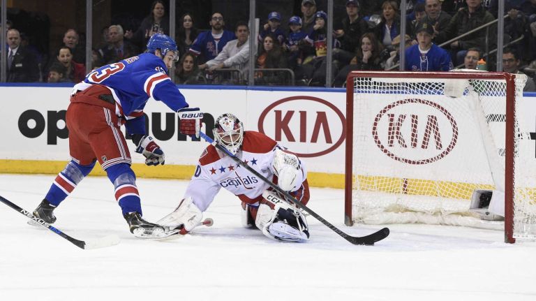 Rangers vs. Capitals 45 New York Rangers right wing Kevin Hayes scores on Washington Capitals goalie Braden Holtby in the first period of an NHL hockey game at Madison Square Garden on Sunday, March 29, 2015.