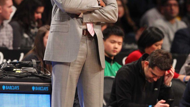 Los Angeles Lakers head coach Byron Scott coaches against the Brooklyn Nets during the first quarter of a game at Barclays Center on Sunday, March 29, 2015.