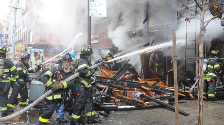 East Village building explosion: Photos 21 The scene of a building fire at East 7th and 2nd ave, in Manhattan, on March 26, 2015.