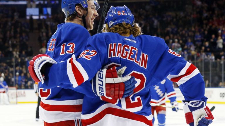 Carl Hagelin #62 of the New York Rangers celebrates his first-period goal against the Anaheim Ducks with teammate Kevin Hayes #13 at Madison Square Garden on Sunday, March 22, 2015.