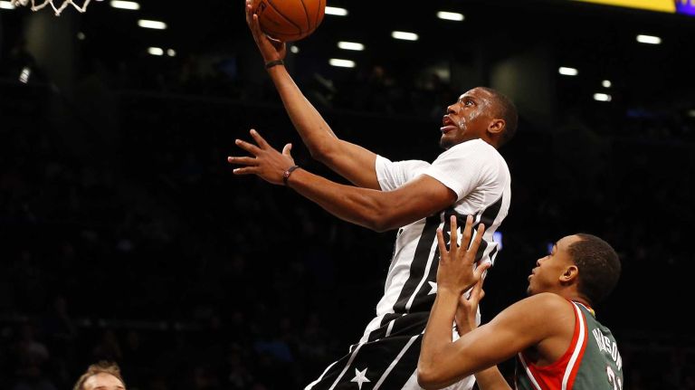 Thaddeus Young of the Brooklyn Nets goes to the hoop for a basket in the first half against the Milwaukee Bucks at Barclays Center on Friday, March 20, 2015.