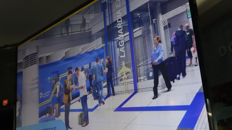 A rendering of the future look  of  LaGuardia Airport,  which includes the AirTrain.