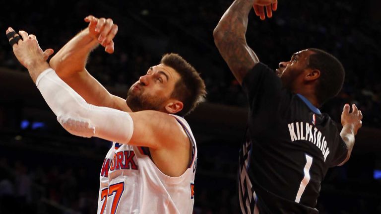 Andrea Bargnani of the New York Knicks battles for a rebound against Sean Kilpatrick of the Minnesota Timberwolves at Madison Square Garden on Thursday, March 19, 2015.