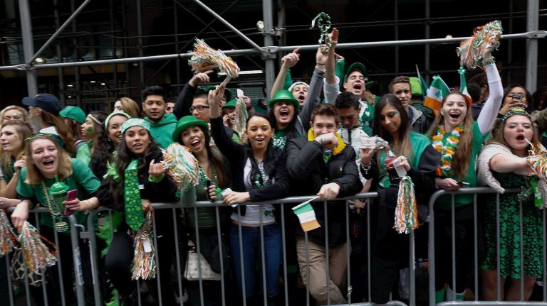 Spectators during the 245th annual St. Patrick's Day parade along Fifth Avenue on Tuesday, March 17, 2015.