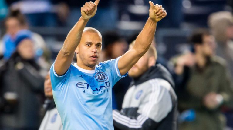 New York City FC defender Jason Hernandez (21) waves to the crowd after the New York City FC defeated the New England Revolution 2-0 at Yankee Stadium on Sunday, March 15, 2015.