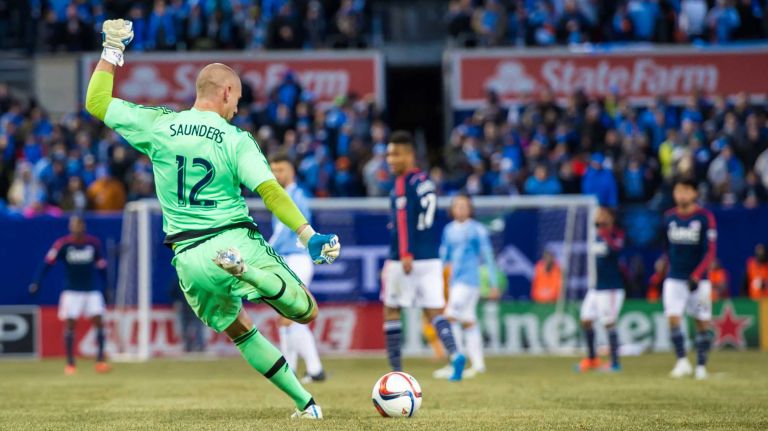 New York City FC goalkeeper Josh Saunders (12) sends a goal kick down the field against the New England Revolution during a game at Yankee Stadium on Sunday, March 15, 2015.