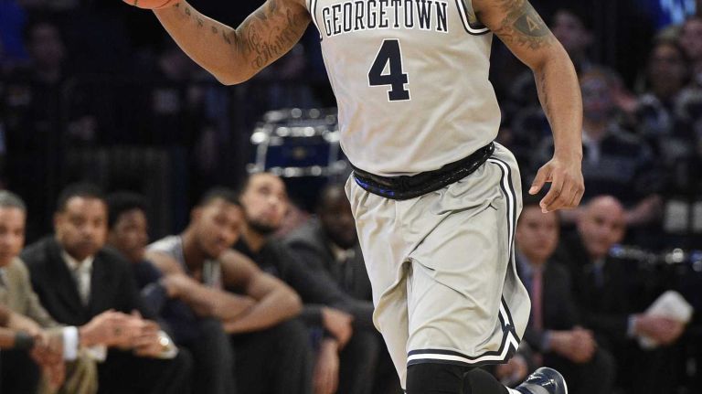 Big East Tournament semifinal: Georgetown vs. Xavier 31 Georgetown Hoyas guard D'Vauntes Smith-Rivera brings the ball up court against the Xavier Musketeers in a Big East semifinal men's basketball game at Madison Square Garden on Friday, March 13, 2015.
