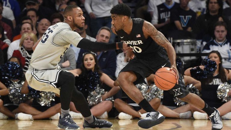 Big East Tournament semifinal: Georgetown vs. Xavier 38 Xavier Musketeers guard Remy Abell drives against Georgetown Hoyas guard Jabril Trawick in a Big East semifinal men's basketball game at Madison Square Garden on Friday, March 13, 2015.