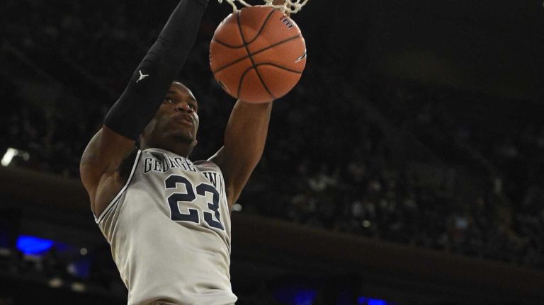 Big East Tournament semifinal: Georgetown vs. Xavier 40 Georgetown Hoyas forward Aaron Bowen dunks against the Xavier Musketeers in a Big East semifinal men's basketball game at Madison Square Garden on Friday, March 13, 2015.