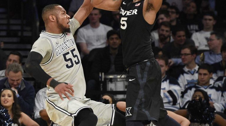 Big East Tournament semifinal: Georgetown vs. Xavier 47 Xavier Musketeers forward Trevon Bluiett is defended by Georgetown Hoyas guard Jabril Trawick in a Big East semifinal men's basketball game at Madison Square Garden on Friday, March 13, 2015.