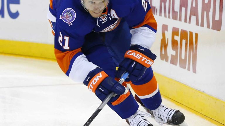 Kyle Okposo of the New York Islanders skates against the Ottawa Senators at Nassau Coliseum on Friday, March 13, 2015.