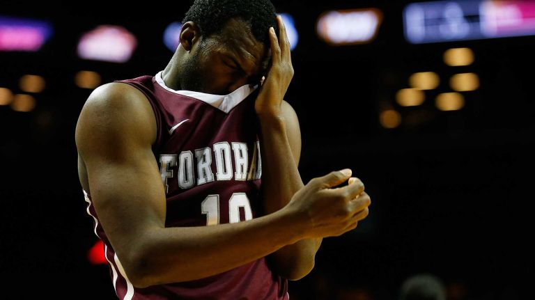 NEW YORK, NY - MARCH 12: Jon Severe #10 of the Fordham Rams reacts after being hit in the eye against the Virginia Commonwealth Rams during the Second Round of the Atlantic 10 Basketball Tournament at Barclays Center on March 12, 2015 in New York, New York. Virginia Commonwealth Rams defeated the Fordham Rams 63-57. (Photo by Mike Stobe/Getty Images)