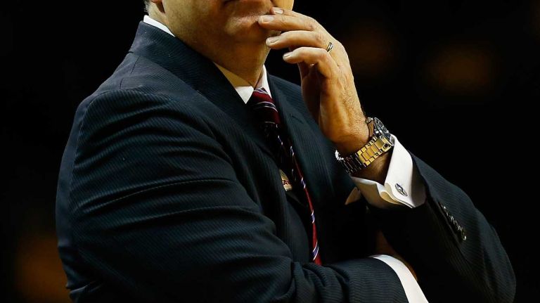 NEW YORK, NY - MARCH 12: Head coach Tom Pecora of the Fordham Rams looks on from the bench against Virginia Commonwealth Rams during the Second Round of the Atlantic 10 Basketball Tournament at Barclays Center on March 12, 2015 in New York, New York. (Photo by Mike Stobe/Getty Images)