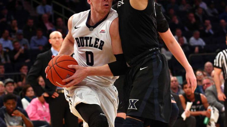 Butler Bulldogs forward Austin Etherington drives against Xavier Musketeers guard Larry Austin, Jr. during the first half of a Big East Tournament game at Madison Square Garden on Thursday, March 12, 2015.