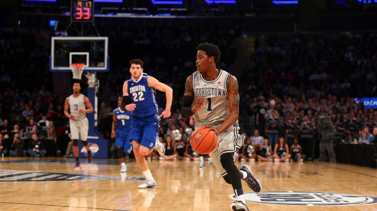 Georgetown Hoyas guard Tre Campbell leads a fast break against Creighton Bluejays guard Avery Dingman during the first half of a Big East Tournament game at Madison Square Garden on Thursday, March 12, 2015.