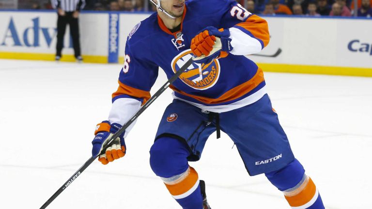 Tyler Kennedy of the New York Islanders skates against the New York Rangers at Nassau Coliseum on Tuesday, March 10, 2015.