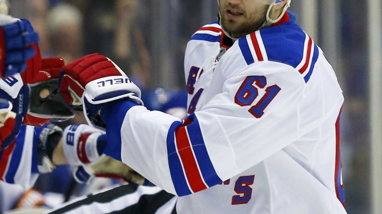 Rick Nash of the New York Rangers celebrates his third-period goal against the New York Islanders at Nassau Coliseum on Tuesday, March 10, 2015.