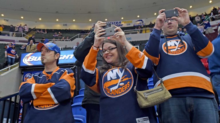 Fans at Islanders vs. Rangers 28 Islanders fans take pictures at Nassau Coliseum during the last Islanders-Rangers regular-season game at the Coliseum on March 10, 2015.