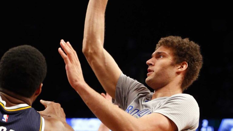 Brooklyn Nets vs. Utah Jazz 40 Brook Lopez #11 of the Brooklyn Nets puts up a shot against the Utah Jazz at Barclays Center on Sunday, Mar. 8, 2015 in Brooklyn, New York.