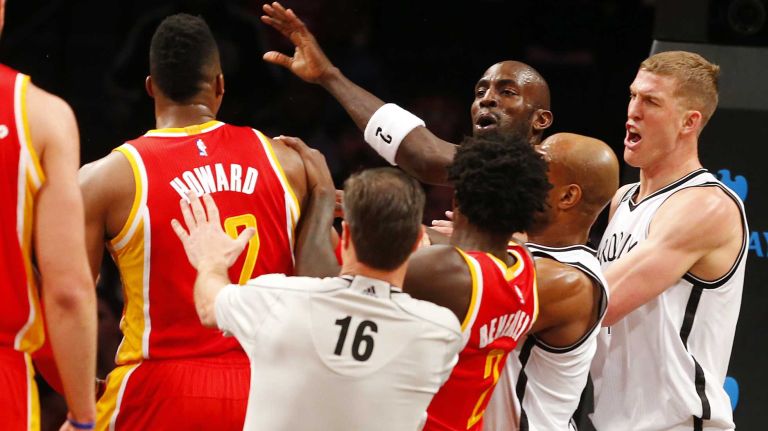 Kevin Garnett #2 of the Brooklyn Nets confronts Dwight Howard #12 of the Houston Rockets in the first quarter of a game at Barclays Center on Monday, Jan. 12, 2015.