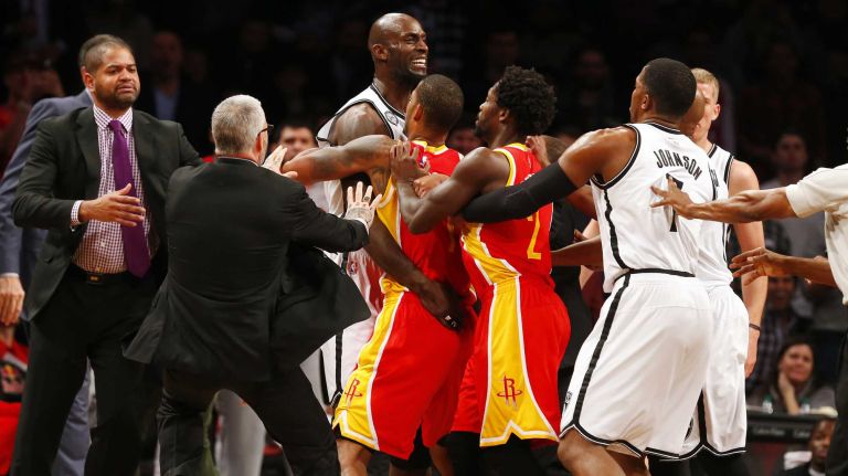 Kevin Garnett #2 of the Brooklyn Nets is held back as he reacts after a first quarter confrontation with Dwight Howard #12 of the Houston Rockets (not pictured) at Barclays Center on Monday, Jan. 12, 2015.