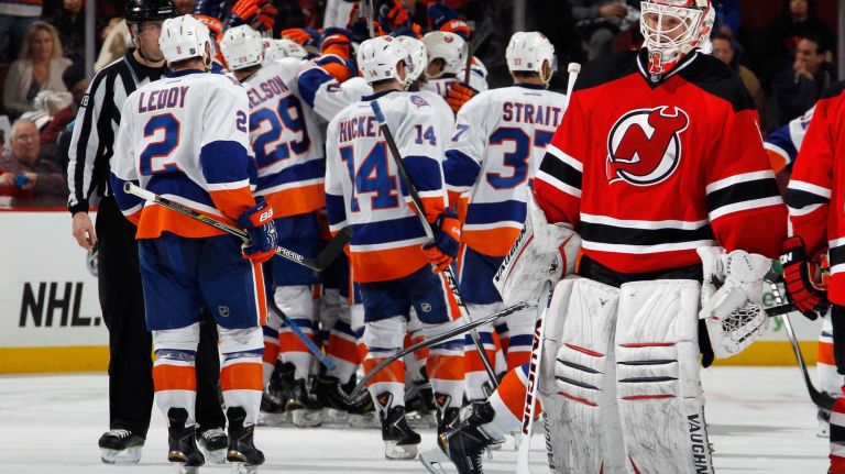Keith Kinkaid of the New Jersey Devils leaves the ice following a 3-2 overtime loss the the New York Islanders at the Prudential Center on Jan. 9, 2015 in Newark, N.J.