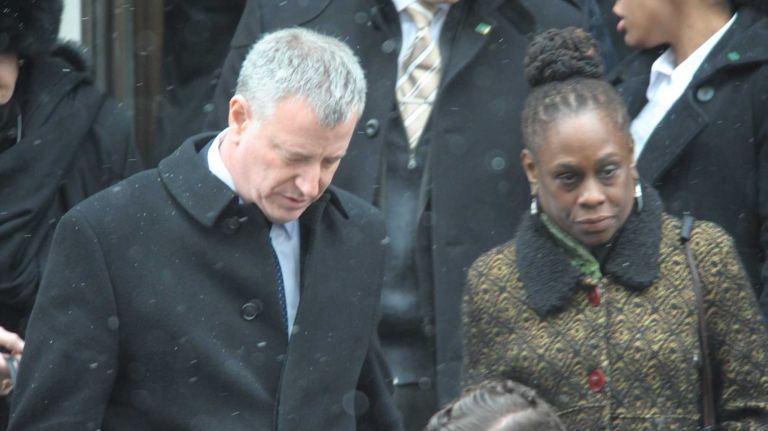 New York City Mayor Bill DeBlasio, and his wife Chirlane at the funeral mass for former Governor Mario Cuomo at St Ignatius Loyola in Manhattan on Jan. 6, 2015.