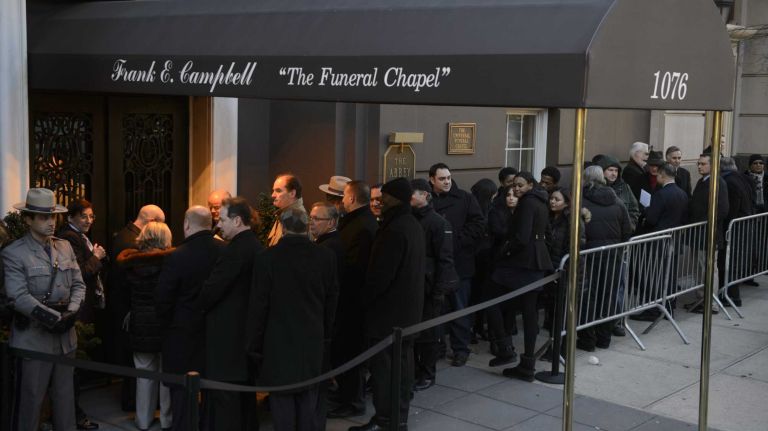 People wait in line at Frank E. Campbell Funeral Chapel for the wake of former Gov. Mario Cuomo in Manhattan on Monday, Jan. 05, 2015. Cuomo, who served three terms as New York State Governor, died at home Thursday from heart failure at 82 while surrounded by family. The death occurred on the same day Andrew Cuomo was sworn into office for his second term as governor.