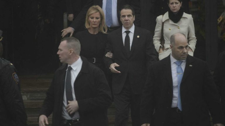Gov. Andrew M. Cuomo and his girlfriend Sandra Lee leave the wake of Det. Wenjian Liu at Aievoli Funeral Home in Brooklyn on Saturday, Jan. 3, 2015.
