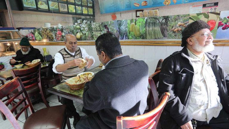 City Living: Kensington 31 Patrons at Abdulla Sweets and Restaurant at 91 Church ave. in Kensington, Wednesday, Dec., 17, 2014.