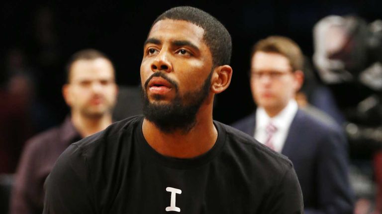 Kyrie Irving #2 of the Cleveland Cavaliers warms up in an 