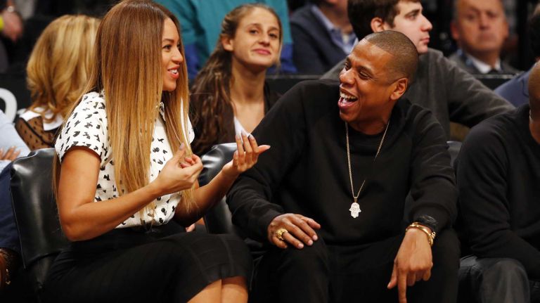 Jay-Z and Beyonce attend a game between the Brooklyn Nets and the Cleveland Cavaliers at Barclays Center on Monday, Dec. 8, 2014.