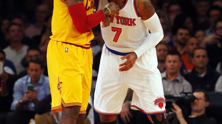 Carmelo Anthony #7 of the New York Knicks defends against LeBron James #23 of the Cleveland Cavaliers at Madison Square Garden on Thursday, Dec. 4, 2014.