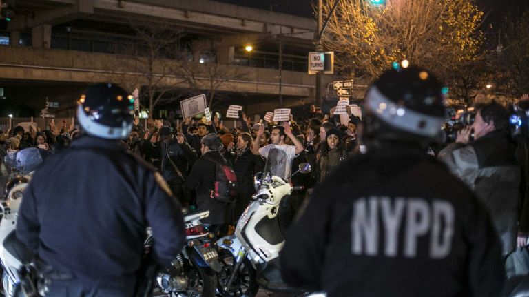 Protestors march on the West Side Highway on Wednesday, December 3, 2014 after a grand jury declined to indict an NYPD officer whose arrest of a Staten Island man led to his death.