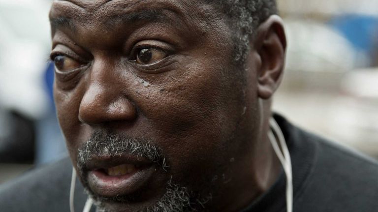 Ben Carr, stepfather of Eric Garner, speaks about the grand jury decision involving his son on Wednesday, Dec. 3, 2014, near the spot where Garner died in July. He said the decision was like a knife wound 